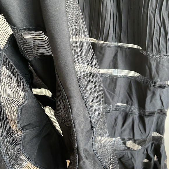 Long, chic black Tadashi Shoji gown with mesh-like panels and ribbed midsection - Picture 8 of 12